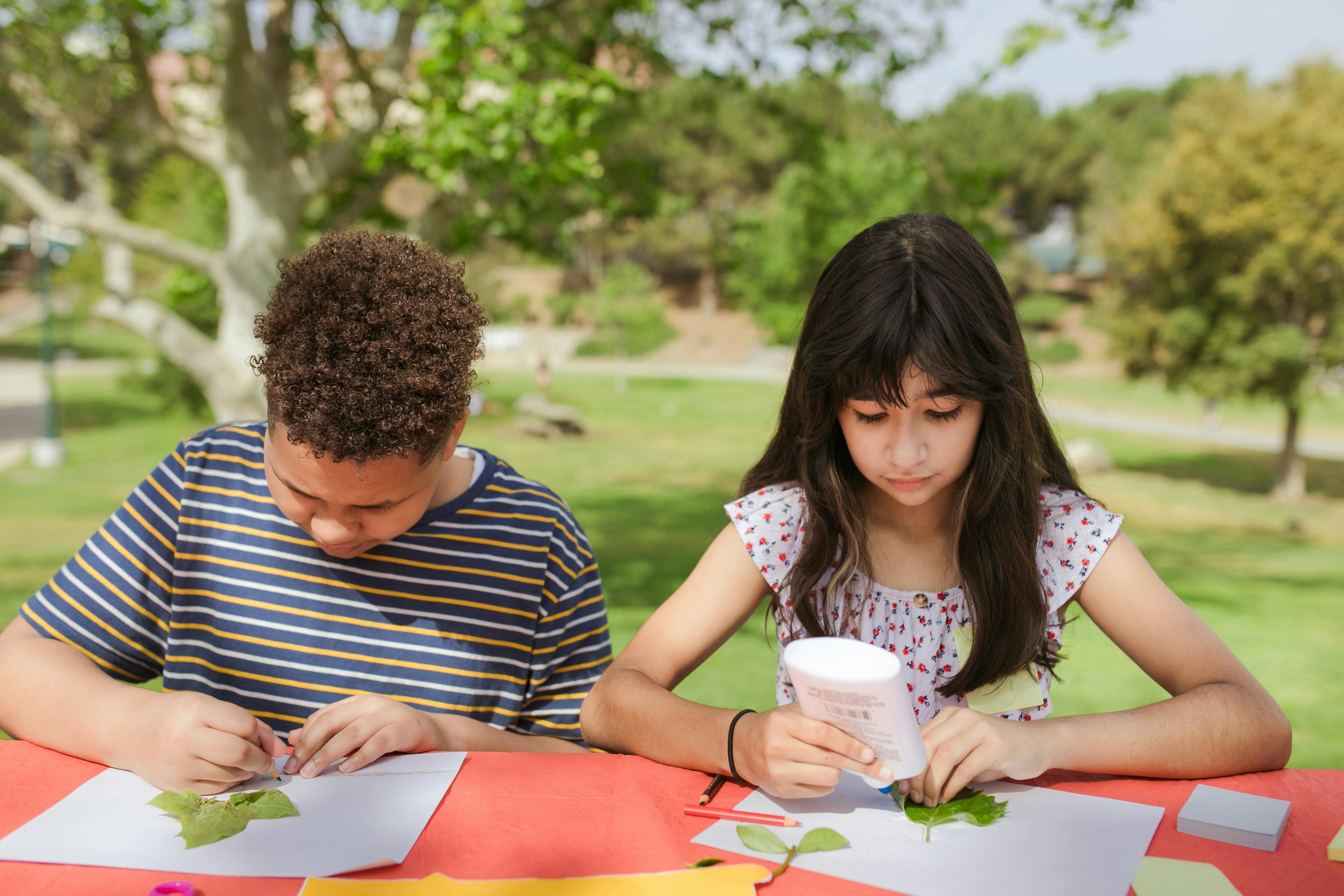 Boy and girl making craft